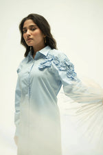 Load image into Gallery viewer, Model in pastel blue dress showing full length silhouette and gentle fabric movement in studio.