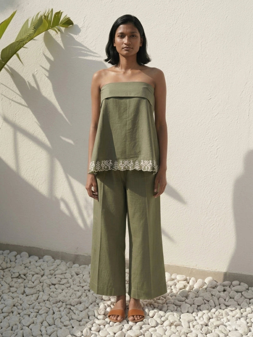 Front view of olive green strapless poplin co-ord set for women with white embroidered hem – sustainable summer outfit
