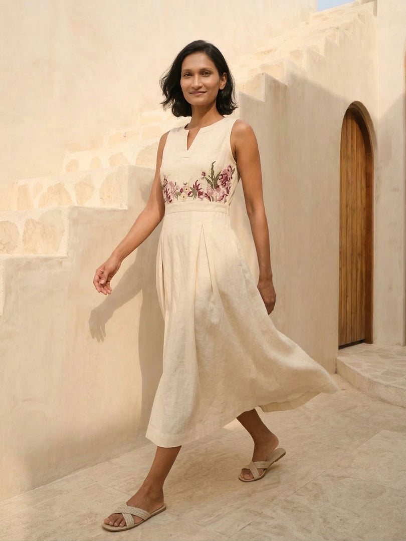 Front view of Celia Linen Midi dress for women in cream with hand-embroidered floral cross-stitch – sleeveless summer A-line midi dress